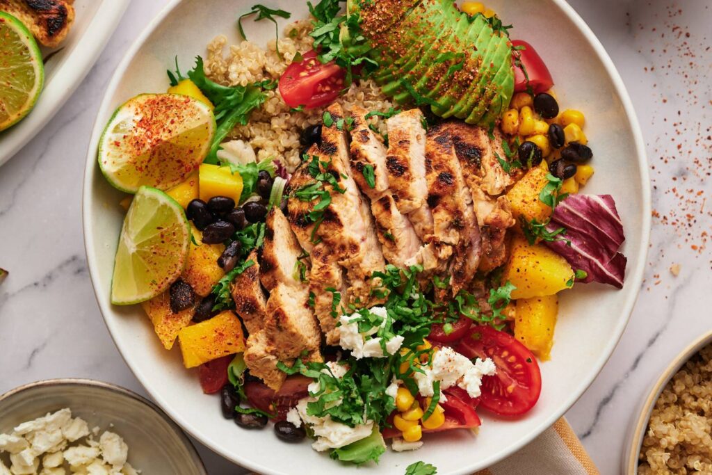 Protein-packed power bowl with quinoa, chicken, and vegetables