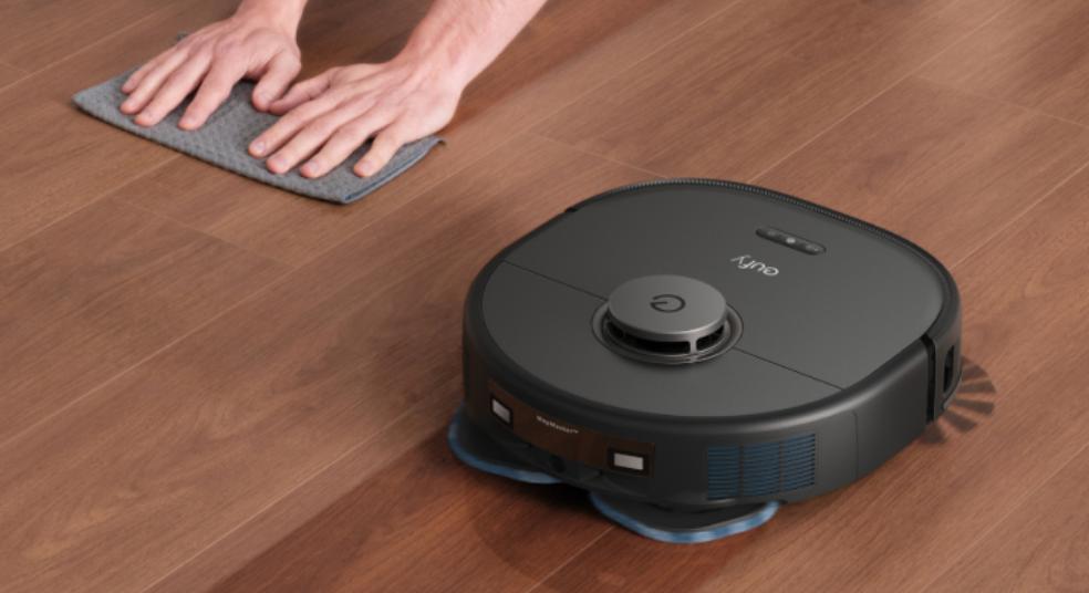 Eufy robot vacuum cleaning laminate and tile kitchen floors