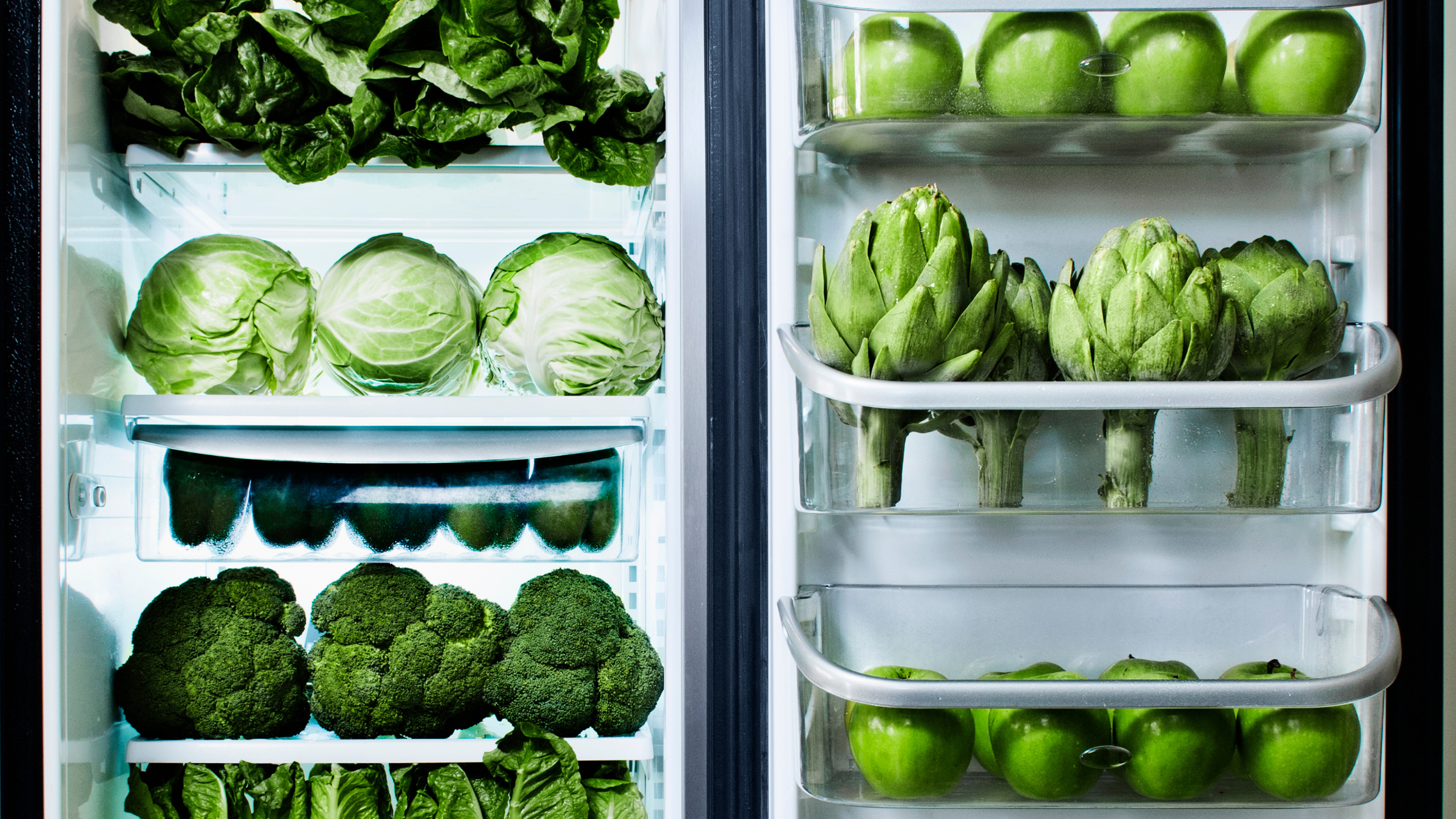 Leafy greens stored in high-humidity fridge drawer to prevent wilting.