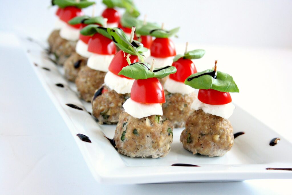 Meatball variations and protein skewers as party appetizers 2025