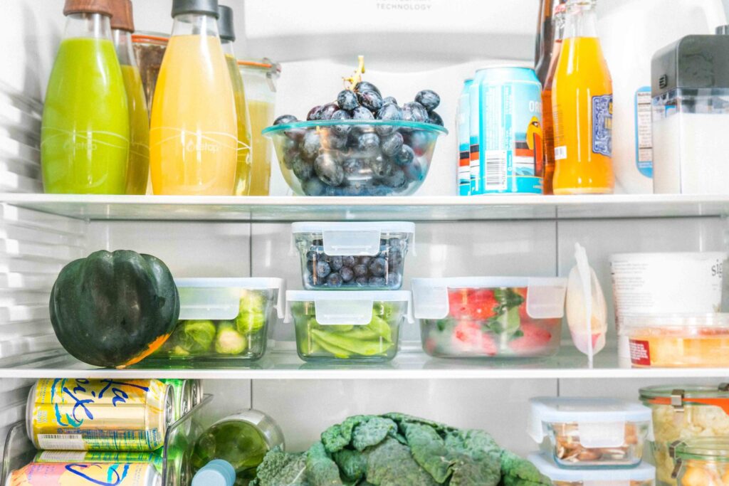 Organized refrigerator showing safe food storage for beginners.